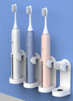 Electric toothbrush placed in a compact bathroom holder
