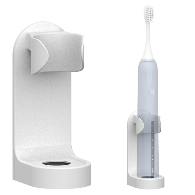 Tidy bathroom counter featuring an electric toothbrush holder