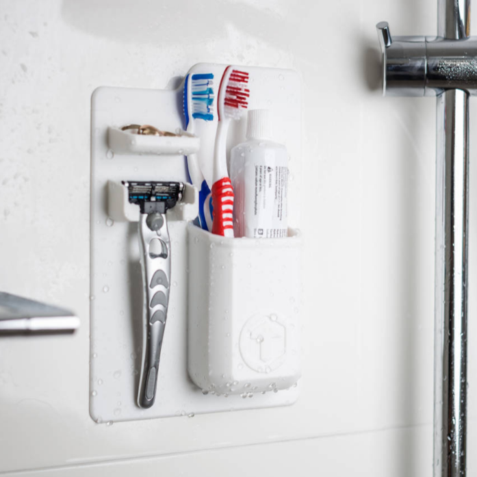 Close-up of the silicone toothbrush holder and storage compartments