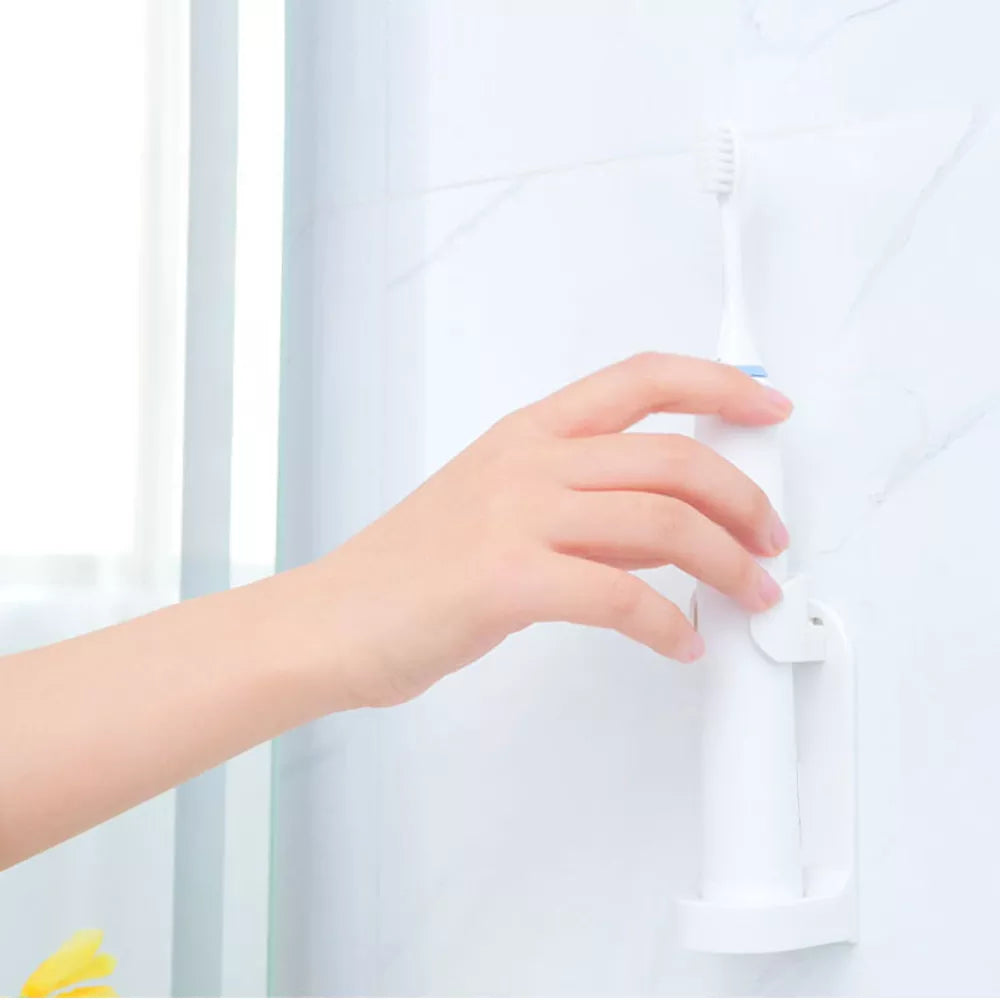 Toothbrush holder helping organise a bathroom counter