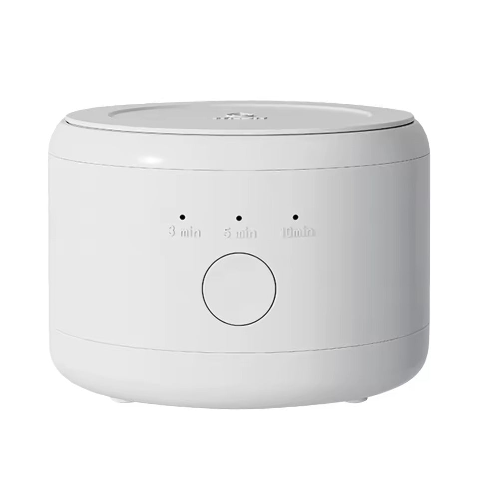Ultrasonic cleaner displayed with a dental retainer ready for cleaning