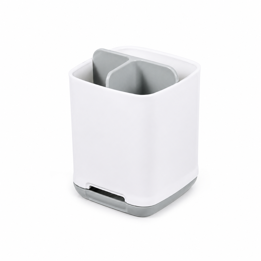 Grey toothbrush holder bathroom organiser beside a sink