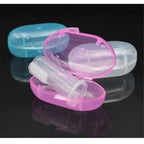 Finger toothbrush shown in use for gentle infant gum cleaning