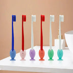 Fish-shaped toothbrush holder cap for protecting a toothbrush