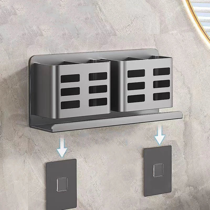 Bathroom shelf displaying toothbrushes in the integrated holder