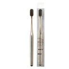 Luxury-style soft-bristle toothbrush in a silver finish