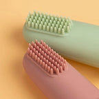Gentle infant toothbrush displayed against a plain background