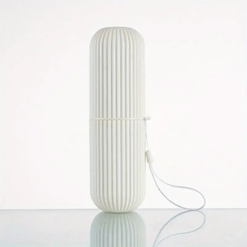 Toothbrush and tongue scraper neatly stored inside a compact case