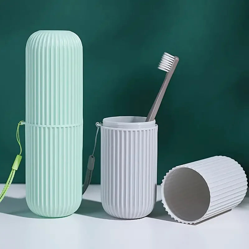 Open toothbrush case showing space for a toothbrush and tongue scraper