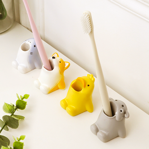 Cute animal toothbrush holder and pen pot for bathroom or desk storage