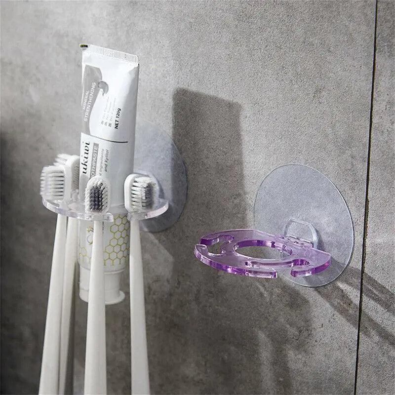 Toothbrushes organised in a compact wall-mounted bathroom holder