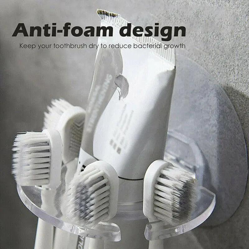 Close-up of a toothbrush and toothpaste holder mounted on a wall