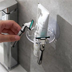 Suction cup toothbrush holder attached to smooth bathroom tiles