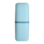 Travel toothbrush case displayed with toothbrushes and toothpaste