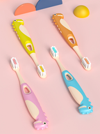 Soft toothbrushes for children aged 2 to 12, shown as an 8-pack