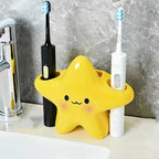 Toothbrushes stored neatly in a star-shaped bathroom holder