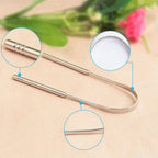 Stainless steel tongue scraper displayed for simple oral hygiene care