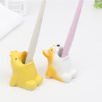Cute animal pen pot for organising pens and stationery on a desk